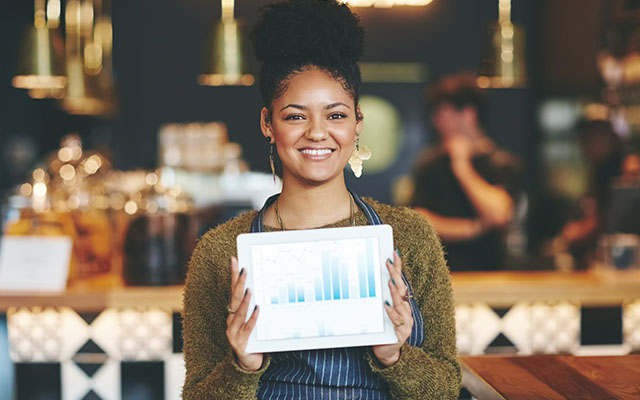 Woman holding graph - Economist's Notebook