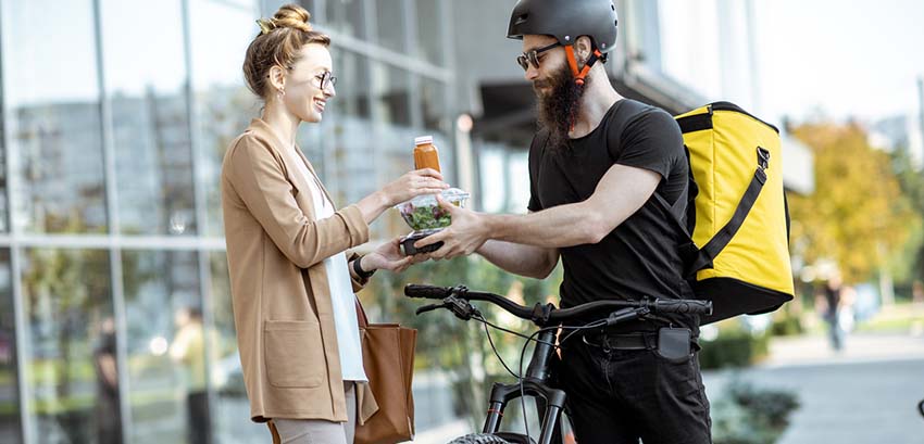 Woman receiving food order