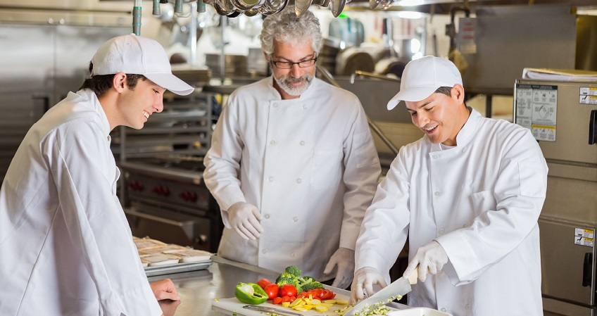 Three chefs in the kitchen