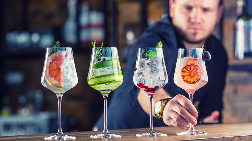 Bartender holding a drink 