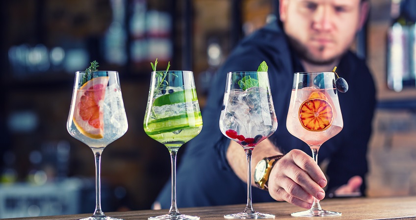 Bartender holding a drink 